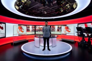Male broadcast engineer in studio
