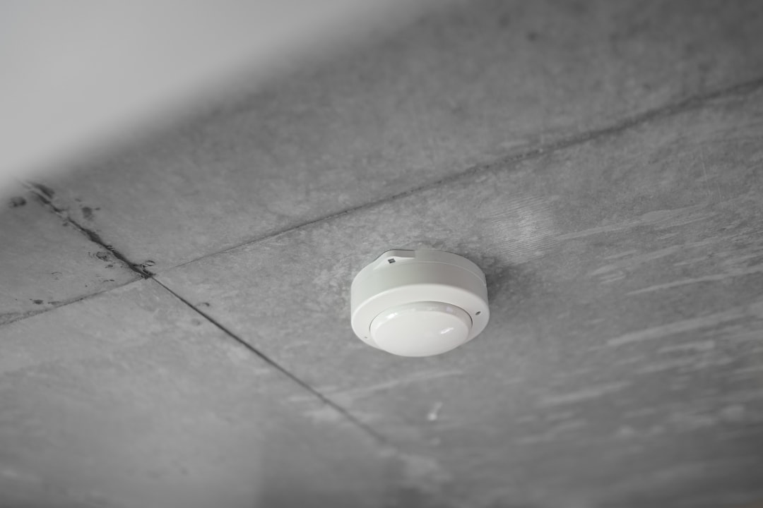 A fire alarm on the ceiling